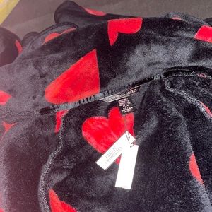 Red and black soft robe brand new with tags has hearts on it